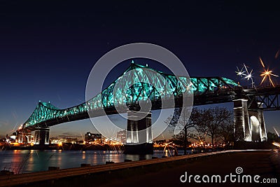 Montreal 375th anniversary. Jacques Cartier Bridge. Bridge panoramic colorful silhouette by night Stock Photo